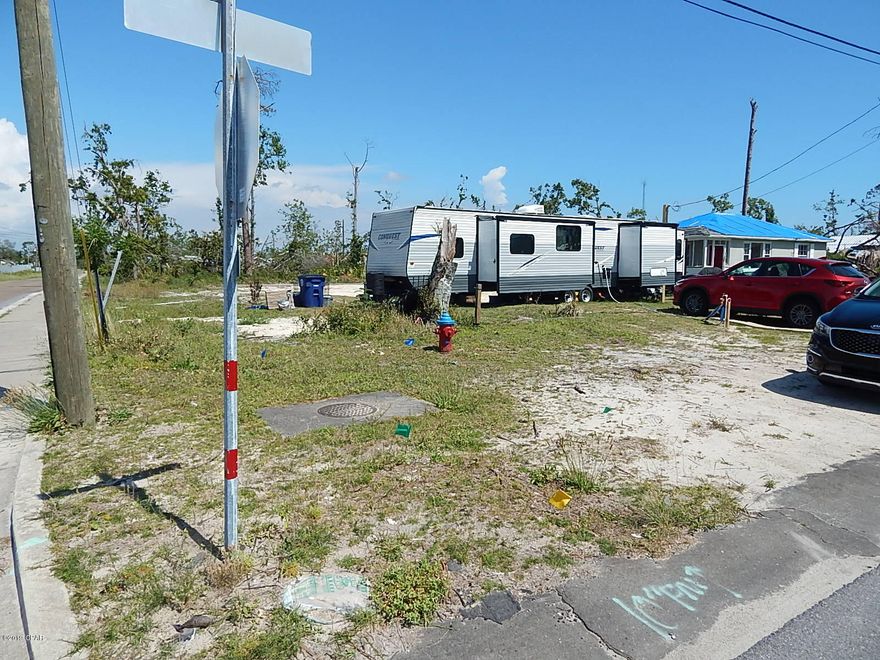 Corner lot in the down town Panama City area. Lot is zoned Mixed Use for a variety of building applications.  Conveniently located next to Bay High School. The home on this property was recently demolished due to Hurricane Michael and has been filled and level. Ready to build. All utilities available. Zoned Multi-Use Residential. Please verify with PC Planning and Zoning that zoning meets your intended use.
