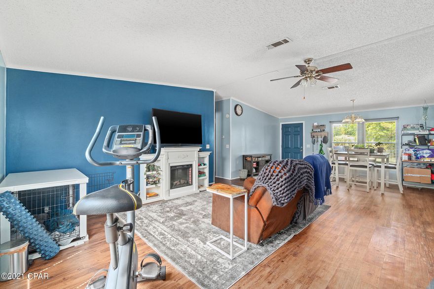 CURRENTLY UNDER CONTRACT, SELLER ACCEPTING BACKUP OFFERS.  Absolutely fantastic Mobile home located off Thomas Drive in Panama City Beach! This 3Br/2Ba home features fresh paint, large rooms, new metal roof, new privacy fence, and huge lot. The Master bath features a garden tub and separate shower.  More than ample space in the kitchen. Open and an abundance of natural light! Out back there is a 16x20 heated/cooled work shop.  It is set up for a sink as well.  This great home is only a few minutes from the beaches, shopping, and dining. All measurements approximate, verify if important.