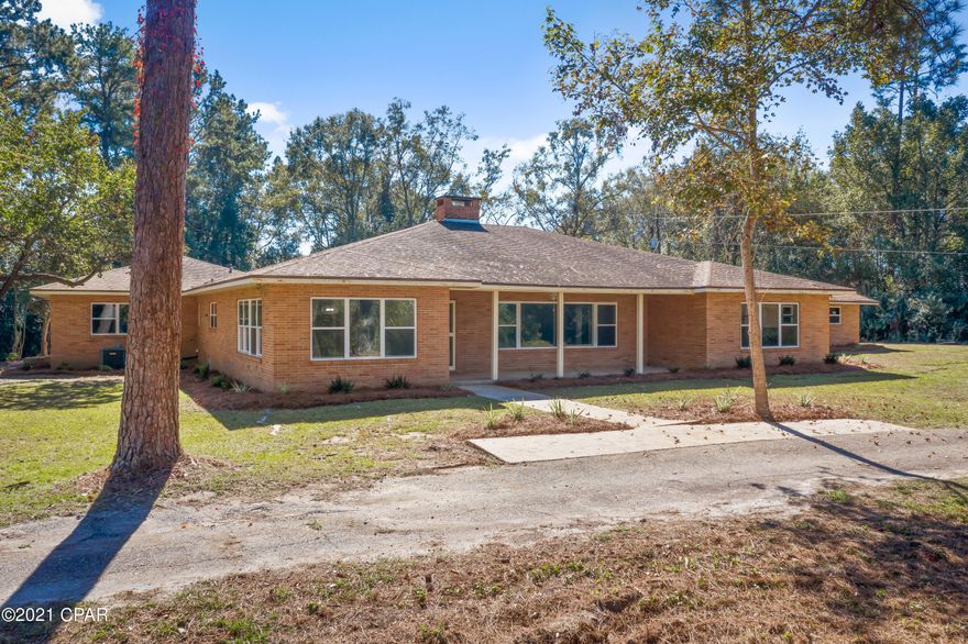 Currently Under contract , But taking back up offers.Home has been completely remodeled from the kitchen to the bathrooms.This home is VERY well built, New plumbing,wiring ,new windows,appliances,cabinets.,a/c  units newer .With 3 bedroom,3 full baths ,2 half baths and separate office Entrance from the house.Attached two car carport , 2 storage rooms and brick storage building. Yard has been freshly landscaped .Property offers a large 16 run dog kennel (needs some tlc) and 2 bedroom apartment that has been updated with new flooring,applanices,paint and roof (Apartment is over the kennels)this  home has a lot of storage and property is just off paved road. This is a must see. Call today