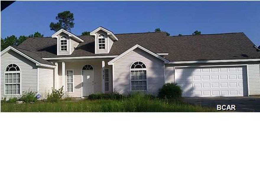 Very nice home with ceramic tile and carpet, split bedroom plan, breakfast bar, formal dining room, raised ceiling, separate laundry room, open floor plan, and 2 car garage.  Near public boat ramp.