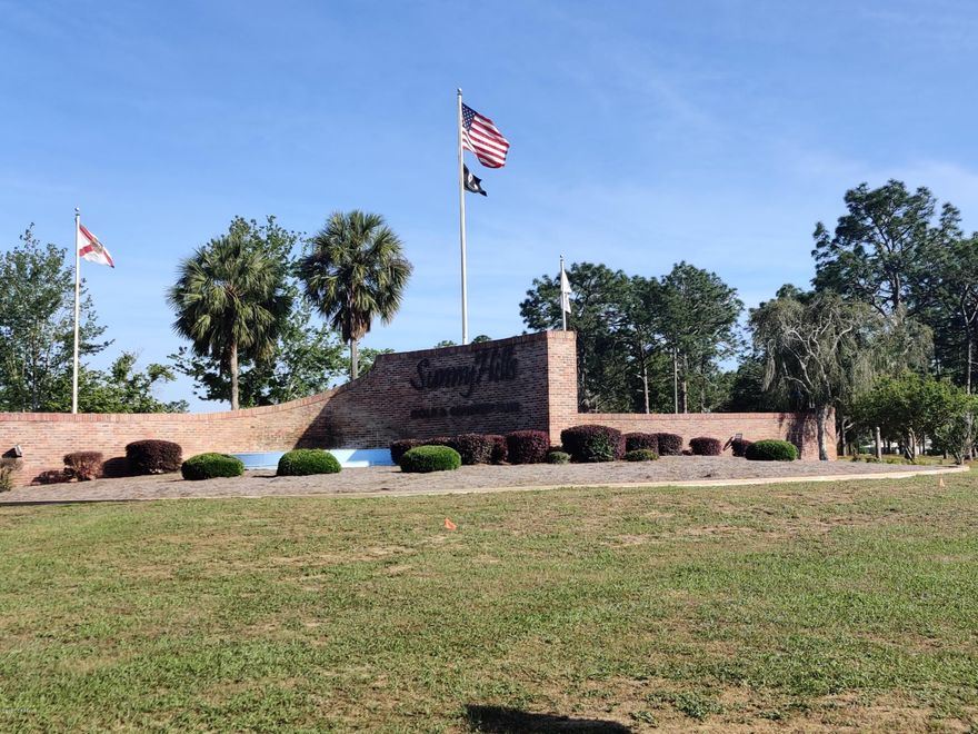 This lot is close to the hwy and has just enough trees, for shade and privacy. Keep up with your social distancing. It is approximately a 45 min. drive to Panama City Beach and all the amazing things it has to offer. The community includes a golf course and lake. This is a great spot, great fishing and plenty of opportunities to explore the area.