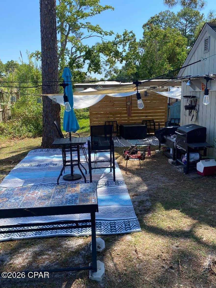 Zoned R-2 (BC) This property holds so much potential.  Cute little mobile home holds a little charm quintessential of Key West style. Property includes a storage unit in the backyard. A large deck on the front of the home. Could be a great rental property long term or short term.  Or maybe you might want to build two townhomes or a duplex and live in one while you rent out the other.
Come see today.