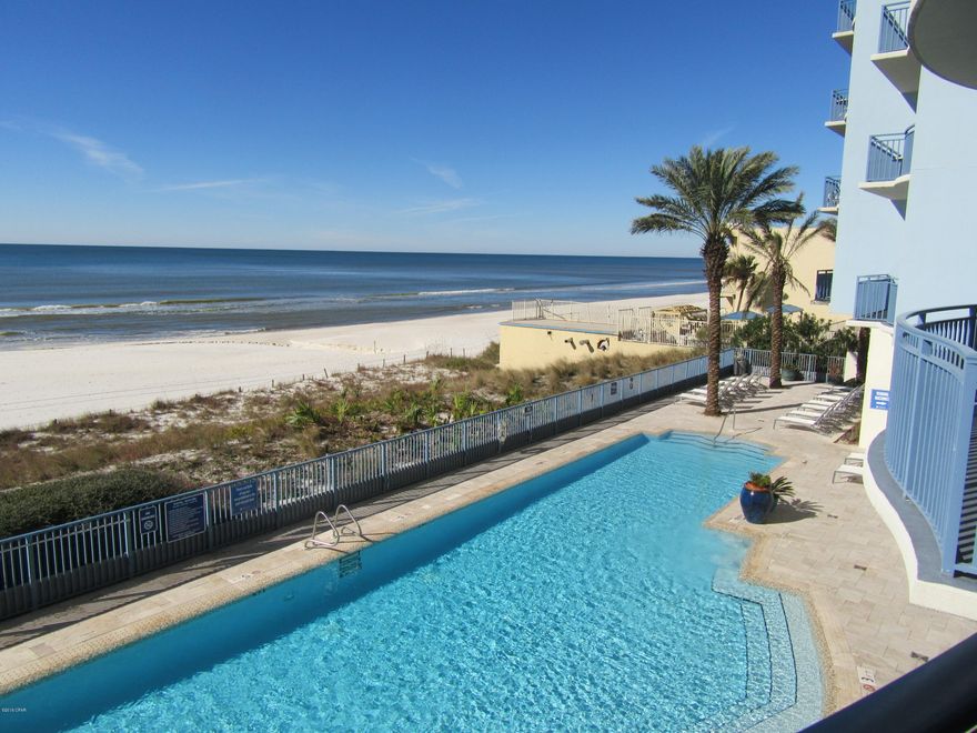 BRING OFFER. Beautiful 3 bedroom with stunning views of the Gulf of Mexico. Tastefully furnished with unusual 10' ceiling in the living & master, in which both have balconies.  The large 3 story garage provides a convenient walk over for owners & guest. This unit is one of the closest to garage, elevators, pool & beach boardwalk.  Great rental history.