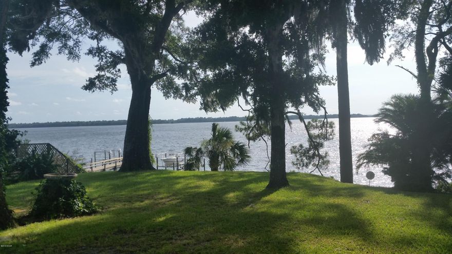 A rare opportunity to own one of the best Waterfront lots in the Panhandle, Perched 25 feet above St. Andrews Bay with spectacular views and easy access to the Gulf of Mexico you wont find a waterfront location better than this. Enter through the front door and take in the view from the living room with large fireplace and built in bookcases. Formal dining room, kitchen, and master bedroom all sport fabulous views. Plenty of living space here with a family room and a den. Den could be additional bedroom or office space. This home retains its original charm and has a very workable floor plan. Rooms have crown moldings and wainscoting throughout. Nice storage for a home this age, including a cedar closet. This home will need some updating, much of the value is in the land. Bring your vision of waterfront living and make it a reality here.