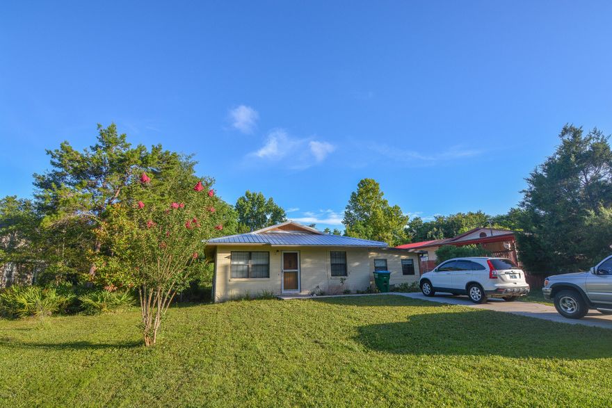 OWNER FINANCING AVAILABLE!! Great little beach cottage. Close to the beach and only minutes to Pier Park. Truly a beach charmer. Large den/family room and spacious sun room. NEW ROOF in 2016. Great neighborhood and close to the beach. Call your agent for a showing today!