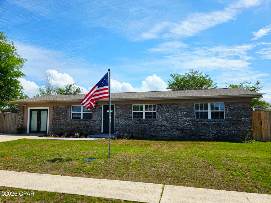 Very cute and beautifully updated starter home!  Open floor concept with kitchen island connecting the living area and kitchen.  White cabinets and black appliances.  Side by side refrigerator, dishwasher, flat top stove and microwave.  French glass doors open up to a beautiful covered back porch.  Beautiful black iron patio table and chairs convey with the sale.  Den or family room is located just off the living room.  Large interior laundry room.  Master suite has it's own attached bathroom with a walk-in shower.  The additional two bedrooms share a nice guest bathroom.  Private fenced backyard with a workshop with power.  The peaceful backyard features lemon and pecan trees.  (All important details should be verified by the appropriate specialist.)