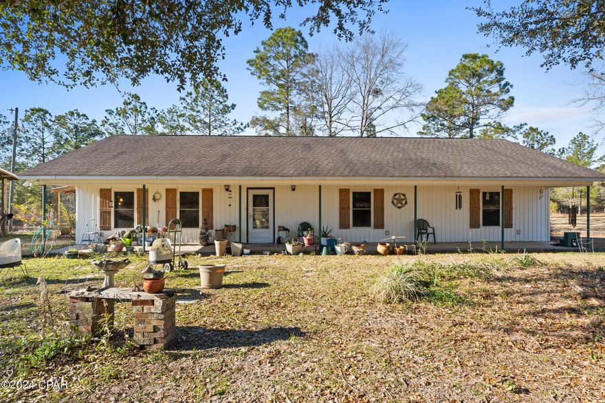 Escape to the idyllic charm of this 3BD, 2BA country retreat, where modern comforts meet rustic allure. Inside, an open floor plan, with cathedral ceilings, recessed lighting, and tongue-and-groove pine create a warm ambiance. Stay cozy by the wood-burning stove on LVP flooring, and enjoy the benefits of recent upgrades like a heat pump/AC and double-hung windows. Outside, discover a full front porch, covered side porch, 2-car carport, 3-stall barn with a tack room, a metal open building, and a quaint chicken coop. The home has maintenance free exterior with tongue and groove pine. The fenced perimeter ensures pet safety Plus, with an average electric bill of $110.00 per month. This home not only captivates with its rural beauty but also offers efficient, cost-effective living. 
Contact your realtor to see this property.