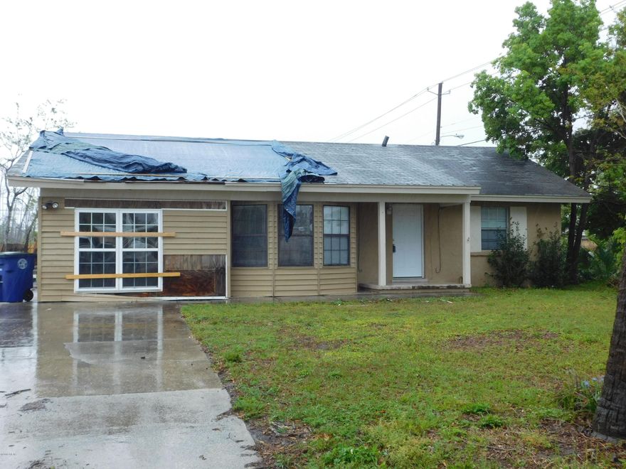 INVESTORS WANTED!  Potential here!   Obvious damage by Hurricane Michael BUT a large portion of the interior appears to be dry and intact.   Good, central location close shopping, restaurants and medical facilities.  Call your agent today.
