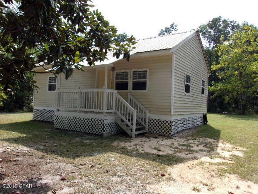 'CURRENTLY UNDER CONTRACT, SELLER ACCEPTING BACKUP OFFERS' Cute as a button is this 1 bedroom 1 bath Frame/Vinyl Home. Sits on 1.7 Acres of land.. Currently has new plumbing, New floor covering, new front covered porch, new paint, new window casings and new skirting around bottom of home. Nice Metal roof. Has nice Magnolia trees and Catalpa tree. Land is about 1/2 cleared and half wooded. Located on county maintained dirt road with frontage on 2 sides. Located short distance to Choctawhatchee River where there is great fishing where you can put those worms from the Catalpa Tree to good use. This is a great spot for a retiring couple, person that loves to fish or a great starter home.  Check it out today.