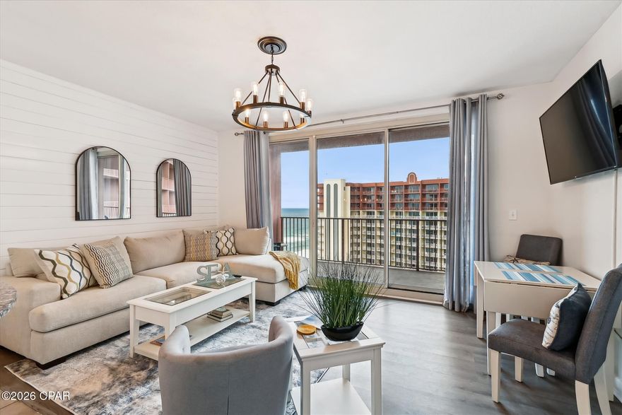 Positioned along the sugar-white sands of Panama City Beach, this highly sought-after Shores of Panama unit delivers the perfect combination of Gulf-front luxury and proven income performance. Known as one of the strongest rental resorts on the beach, Shores of Panama continues to outperform. This floorpan with the bedroom on the gulf consistently producing anywhere $55K-$65K annually. That's a solid ROI for the price you're paying!!

This beautifully REFURBISHED and RENOVATED condo showcases floor-to-ceiling Gulf views from both the primary suite and main living area, filling the space with natural light and uninterrupted coastline scenery. The coveted L-shaped floor plan offers a rare, oversized double-wide balcony, providing additional outdoor living space ideal for dining, entertaining, or simply soaking in the breathtaking sunsets from a higher floor vantage point.

The gulf-front primary suite offers direct balcony access and sweeping ocean views, an extremely desirable feature for renters. The kitchen is fully equipped with modern stainless steel appliances, granite countertops, and generous cabinetry, creating a functional yet stylish space for extended stays. Interior features include LVP flooring throughout the living areas, tile in the bathrooms, and a true bunk room with its own enclosed space, a key advantage for rental privacy and guest comfort. Coastal-inspired furnishings complete the inviting, turnkey design.

Owners and guests can enjoy access to one of the most impressive lagoon-style pools on the beach, a spacious sun deck, on-site fitness center, and direct beach access, all within a full-service, gated resort environment.

This unit also includes a rare deeded, covered parking space on the 11th floor (Space #1192) with secure owner access and 24-hour security, adding both convenience and value.

Whether you're looking for a high-performing investment or a beachfront escape, this Shores of Panama condo checks every box. Strong rental history, premium layout, exceptional amenities, and unbeatable Gulf-front views make this a standout opportunity at 9900 Thomas Drive, Unit 2123.

Schedule your private showing today and secure your place along the Emerald Coast.