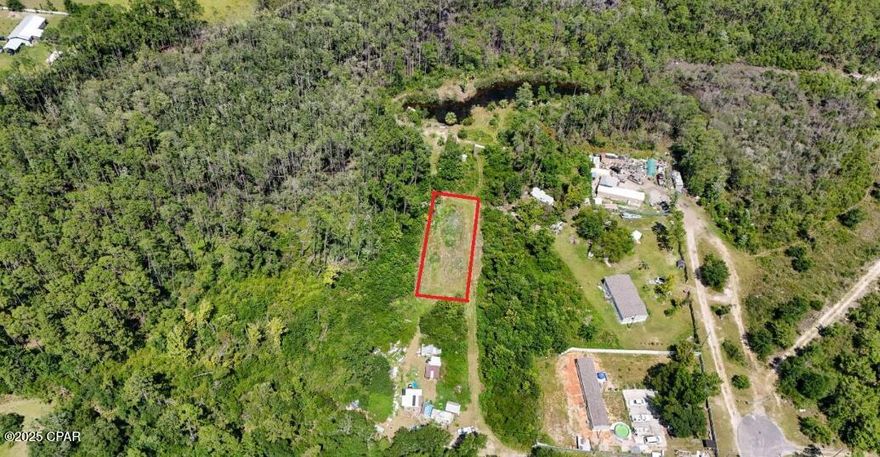 If you're searching for a secluded lot with easy access, you won't want to miss 00 Raccoon Road. This property is ideal for anyone needing some personal space while still being conveniently located just outside of Panama City. With the world's most beautiful beaches only a short drive away and several natural springs in Florida nearby, this lot provides numerous opportunities for convenience, employment, healthcare, and adventure. Contact your favorite Realtor today to learn more or to make an offer.