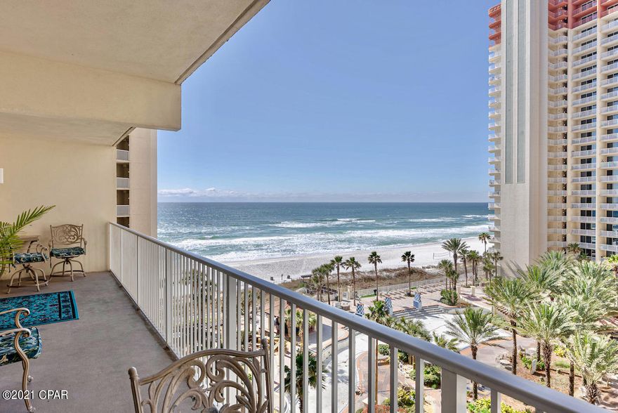 A Premium 2 Bedroom 2.5 Bath plus bunk room L type condo with huge double balcony over looking the pool facing the Gulf for  beautiful Sunset watching -sipping on your favorite drink.  This is the ONLY condo in Shores of Panama that has a full WALL OF WINDOWS in the master bedroom and a sliding glass door out to balcony. Shores of Panama is a Tuscany style Condominium of gulf front accommodations with unparalleled amenities with approx. 500 foot of Gulf frontage, with Gulf side pools, hot tubs two tiki bars serving lunch & dinner.   Large heated in-door pool & hot tub 

 Includes 3rd floor assign covered parking space.  The Shores of Panama is an excellent location next to Pineapples Willy's and is within walking distance of other restaurants & entertainment.