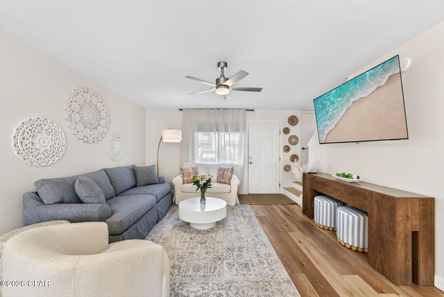 Totally renovated fully furnished 2Bd/ 2.5Ba, 1,008 SqFt townhome located in Gulf Highlands Beach Resort. Updates include new shaker-style, soft-close kitchen cabinets with White Lace quartz countertops, a large island/breakfast bar, and a brand-new Whirlpool stainless steel appliance package. Additional upgrades include a newer roof (2019), tankless gas water heater, newer HVAC, fresh interior and exterior paint, luxury vinyl flooring throughout, hardwood stairs, brand new furniture. The home also features new trim, shiplap accents, an updated lighting package, and fully renovated bathrooms. Laundry area includes washer and dryer.

The unit is conveniently located next to the heated pool and offers an oversized patio, along with two assigned parking spaces directly in front. The property is located in Flood Zone X, so flood insurance is not required. Low HOA fees with both long- and short-term rentals allowed. Ideal as a primary residence, vacation home, or income-producing investment.

Gulf Highlands Beach Resort is centrally located in the heart of Panama City Beach, directly across the street from the beach. The community offers a private, gated beach access with a crosswalk and traffic light across Front Beach Road. This manned, guard-gated resort features a Gulf-front clubhouse with pool and snack bar, plus 10 additional pools (five heated), four tennis courts, pickleball and shuffleboard courts, an 18-hole mini golf course, two playgrounds, a fitness center, and a conference center--all included in the HOA. The resort is golf-cart friendly and within walking distance to restaurants, shopping, and entertainment, with plenty of streets for walking or biking.

Great financing options available, including FHA and VA. Call today for your private showing!