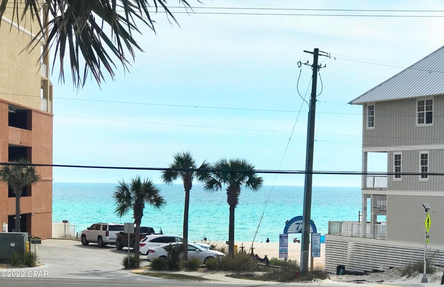 Perfect investment rental opportunity. Steps away from the beach, turn-key 2 bedroom / 2 full bath short-term rental condo with Balcony Gulf View, located right across public beach access #72. This is an excellent short-term rental opportunity in a central PCB location. Low HOA! Furnished, 2 bed/2 full bath, vacation rental zoned condo, with Gulf views from front balcony! Replaced windows and sliding doors. Bedroom and full bath on lower floor; second bedroom and full bath on upstairs. Two parking spaces. Southwind HOA includes general building insurance, community pool, pest control; sewer/water; TV Cable.