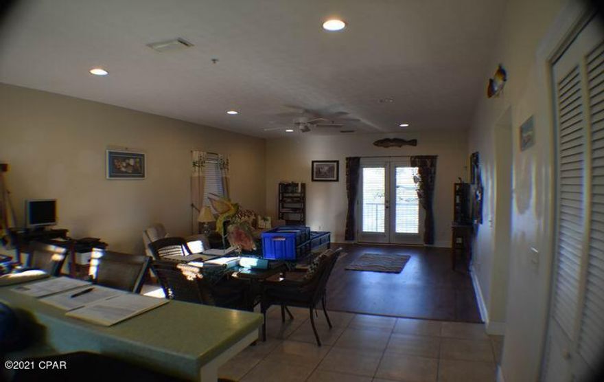 This Bonita Point Condo has 1200 sq ft of well laid out space that is an open floor plan and has a great design. This unit overlooks Grand Lagoon from the Living Room, Master Bedroom and the Balcony. There is new Luxury Vinyl Plank flooring in the Living Room and New carpet in the Bedrooms. A new Ceiling Fan is in the Living Room. The HVAC system was replaced in the last 2 years with a high efficiency system and the Water Heater has also been replaced. The complex has a Clubhouse, a Pool and there are private boat slips with lifts available to rent. You can have your boat and easy access to the Bay or Gulf for sports or fishing. It's a short walk to the Gulf and there are awesome restaurants and shops close by. This unit includes Hurricane Shutters and has 2 storage closets on the balcony