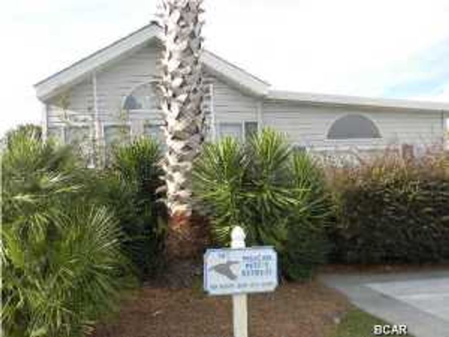 OWNER FINANCING!! Affordable living in Panama City Beach located in a gated community. Being sold completely furnished. 1 Bdrm 1 Bath. Living room is 12x25! Has sliding glass doors leading to a covered deck. Fabulous rental for long term or short. It features a serene and secure atmosphere on 28 acres just minutes away from world famous St. Andrews State Park and Panama City's most beautiful beaches. Amenities Private clubhouse, 2 pools (one is heated), hot tub, fitness center, playground, and a board walk surrounding lake. (fishing allowed) $85,000 Age, SF and room size apprx, if important please verify