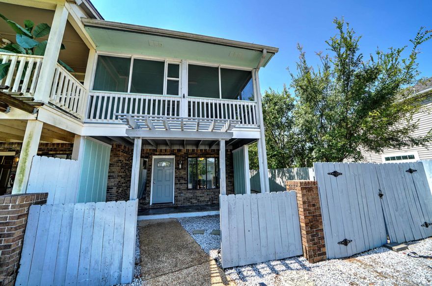 'This corner unit Townhouse features a large fenced in backyard with a deck. A gated RV, golf cart, or boat parking. All appliances including AC are less than 4 years old. This popular East end location also features a screened in porch. Inside features a downstairs master bedroom and new flooring throughout. Washer and Dryer are included. This will make a great rental or second home as there are no HOA fees.