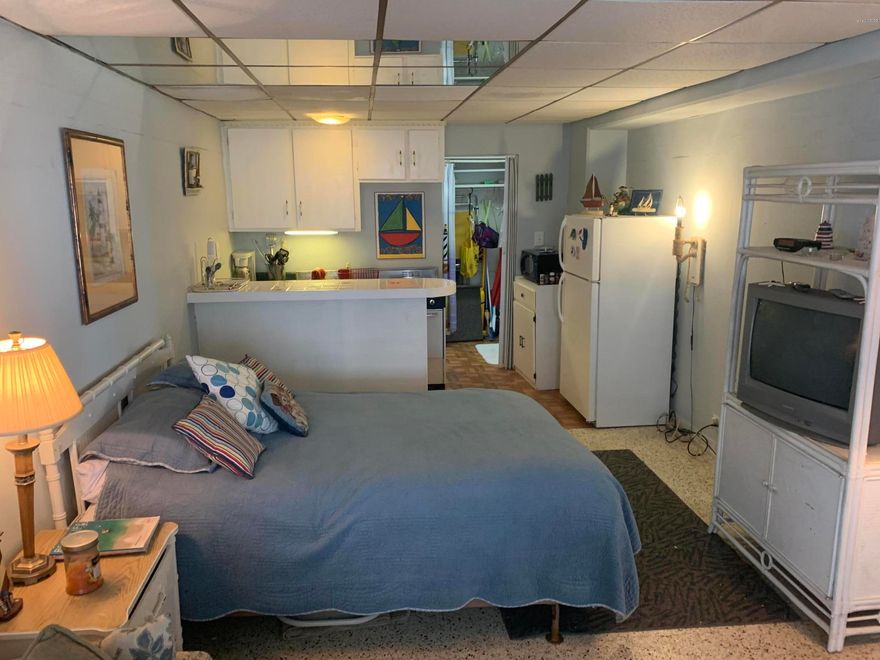 Beachfront at a great price! This second floor unit is located on the east side adjacent to Bid-a-wee Beach Unit is fully furnished and includes queen bed and sofa bed.  amenities include new swimming pool, covered and uncovered beachside decks, bbq grills, owners lounge, elevators and recently updated exterior.  for rental, vacation or both. COA fees cover electricity, water, trash, pest control, cable and internet. Walking distance to restaurants, outdoor activities and shopping. pier park