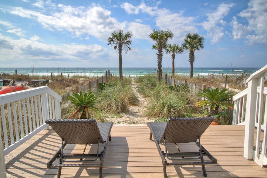 COMPLETELY RENOVATED AND simply gorgeous three level GULF FRONT townhome with spectacular views from all 3 floors. This small 15 unit townhome complex has NO HOA DUES. The townhome features a Single Car GARAGE, ELEVATOR, custom tile floors throughout, stainless steel new appliances and exotic granite countertops in the kitchen & bathrooms, outdoor kitchen, fenced back yard, all new paint, crown molding, custom trim work, built in wine refrigerator, gas tankless water heater, NEW HVAC system (2017), prewired for surround sound, and composite decking to include glass railing for unobstructed views. All this and more on the desire-able quiet west end of the beach. This Townhome is EXCEPTIONAL and conveys partially furnished. Close to shopping, dining and this home is perfect for entertaining.