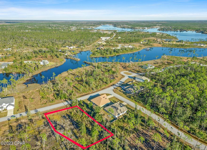 This exceptional lot boasts unparalleled views of Laird Bayou and a serene freshwater lake, offering a haven of natural beauty and boundless opportunities. Nestled strategically near Mexico Beach and Callaway, this prime real estate offers a harmonious blend of seclusion and convenience.Beyond breathtaking vistas, this location is brimming with vibrant energy from neighboring communities. Meticulously improved, this carefully curated lot boasts utilities ready for seamless integration into your dream home. A well-thought-out floor plan awaits, providing the canvas for your perfect living space. With two additional lots available, you have the unique chance to expand your retreat or secure your private sanctuary in this waterfront paradise.Craft your dream home with peace of mind, knowing that the essentials are in place, freeing you to focus on perfecting your vision. Laird Point invites you to create a life where each day is a masterpiece, where the bayou's natural splendor and the lake's gentle lapping become your daily soundtrack. Don't miss this opportunity to embrace coastal living at Laird Point. Schedule your visit today and turn your dream home into a reality amidst Laird Point's serene beauty.