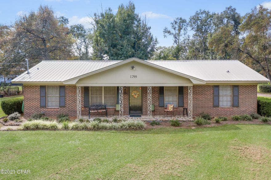 UNDER CNTRACT SELLER TAKING BACK UP OFFERS! Located just off of Falling Waters Road, this 3 bedroom, 2.5 bath home has so many features!  Large utility room with plenty of space for a freezer.  Living area is open to the kitchen.  Kitchen has plenty of storage and has a breakfast bar! 

 Home features a great master suite.    Master suite features two closets, nice tiled shower.  Additional bedroom has a half bath.  Home has a large Florida room on the back of the home.  Property features a stand alone RV cover.  There is also a large detached workshop with carport and lean to.  There is an enclosed  kitchen/entertaining space that also has a fish cleaning station.  Nicely landscaped yard.