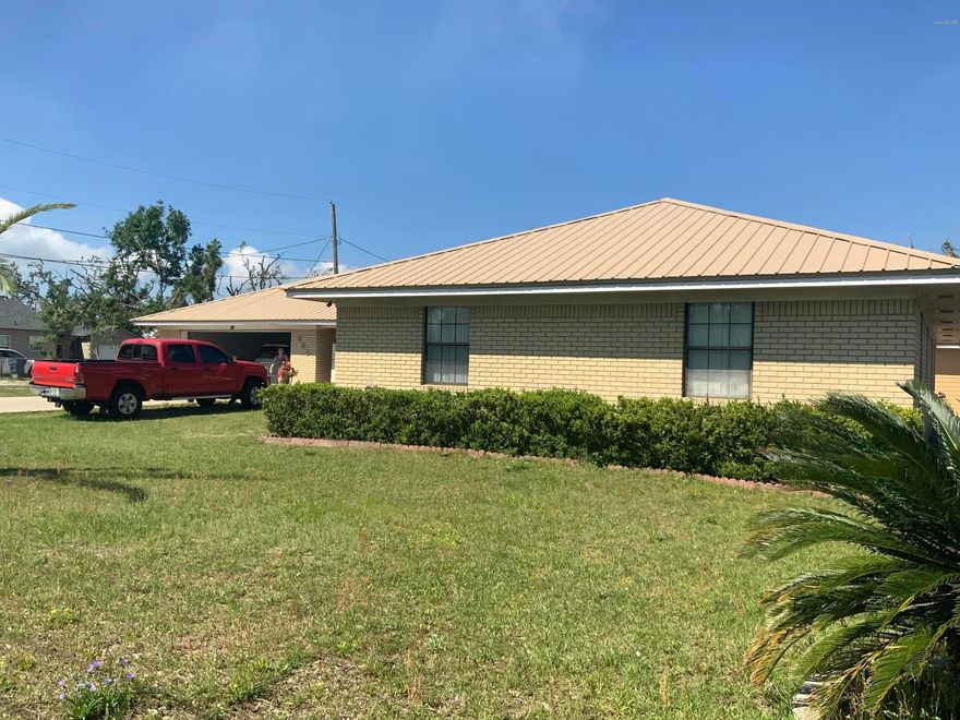 Large brick home, situated on a corner lot. This home offers a new roof, tile and laminate flooring throughout, and a brand new workshop in the back yard. Please verify all dimensions if important.