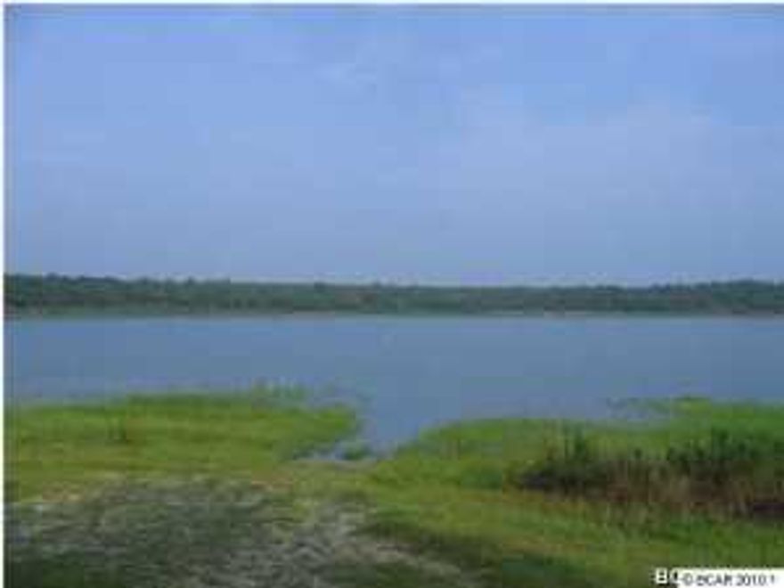 629 acres of high and dry land with a +/- 90 acre spring-fed lake (a/k/a Cogburn Pond, Compass Lake, or Lake Helen). The 90 acre lake has an old plat that includes 146 single family lots with 10 acre tracts making up the rest of the property. The spring fed, limestone lake is over 60 feet deep and ringed with large oak trees. The current zoning allows for one unit per ten acres. Rezoning and additional infrastructure could achieve a much higher density. 100' ROW easement from Hwy 20. The location, access and features of this large tract allow for many potential recreational and development opportunities. Call today to setup a tour of this North Florida paradise.