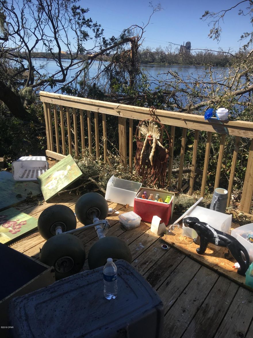 DO NOT ENTER THE HOME. Waterfront Lake Martin.  

There is a home on property that was destroyed during Hurricane Michael that needs to be removed.  Located on the corner with a dock.