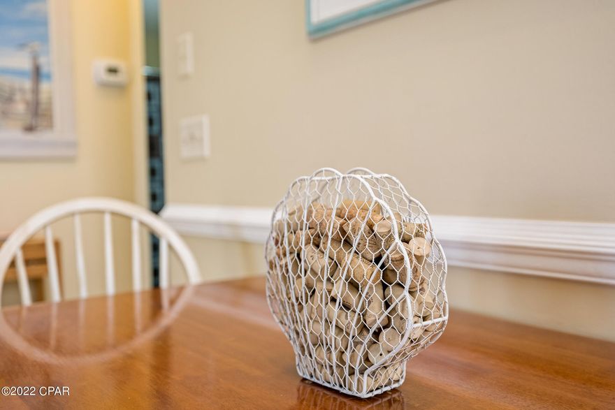 Adorable Coastal Cottage just steps to dedicated beach access! Pristine condition, light and bright with private patio (new patio tile and exterior French door), new roof 2019, new HVAC system & water heater 2017, HVAC on service plan, Smooth ceilings done 2021,newer interior/exterior paint, Quartz countertops, new backsplash 2019, new lighting kitchen/baths 2021. All window panes replaced, New king mattress in lower bedroom, new queen in upper bedroom. New LVP flooring on the 2nd floor! Horizon South has 4 pools, hot-tub, mini golf, tennis/pickleball courts, shuffle board and more! Horizon South has some of the best amenities on the beach! Wonderful West-end location, close to Pier Park, shopping, dining and more!