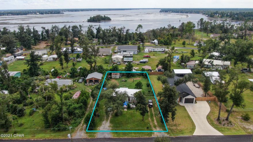 Great country living investment! This place is right off of Deerpoint Lake and 100 Yards from a public boat launch. (Tharpes landing)

Mobile home could use some TLC, or could be removed for your own blank canvas. the property has a a septic tank already, with county water and an updated power pole.