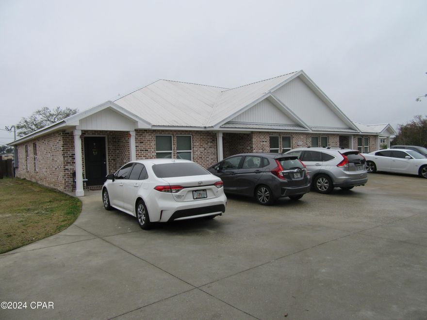 Located in the much desired community of Springfield, this beautiful like new 1 story 3 bedroom 2 bath quadplex is convenient to shopping, dining, schools, and centrally located to the Worlds Most Beautiful Beaches and Military Installations. Improvements include but not limited to new wood plank flooring, paint, trim, upgraded fixtures, and custom cabinets, stainless appliances. Living area is a very large open space, island bar for entertaining. All property sizes and ages are approximate, please measure and/or verify if important. School assignments are subject to change, please check with Bay County for most accurate information. Deposit is the same as the rent. No Pets allowed.