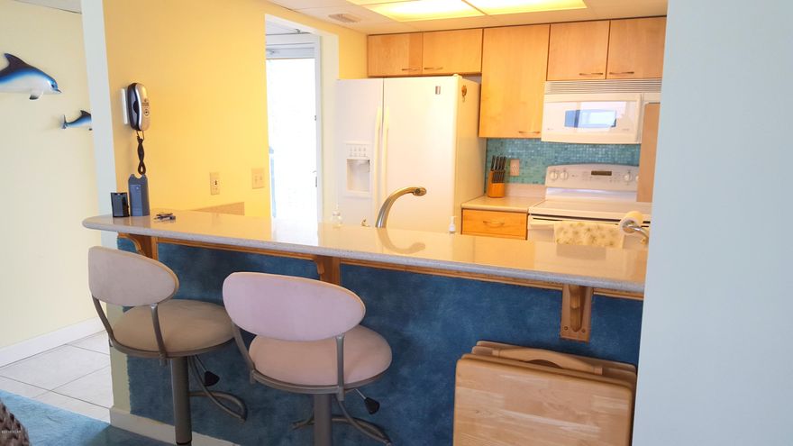 Fabulous condominium facing the beautiful waters of the Gulf of Mexico. YES... OH Yes the bedroom is GULF FRONT. Gulf views from all rooms of this gorgeous condo, the bedroom, kitchen, living/dining all face the Gulf. Also, relax on the over-sized balcony in privacy. That's right, your neighbor can't look over. This well maintained resort is a tropical paradise. Lush landscaping, 6500 sq ft lagoon pool, two Polynesian pools, each with whirlpool and spas, an on-site bar & grill (open seasonally), BBQ Area and Fitness center. This is a must see condo.