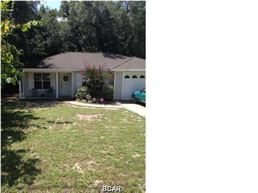 3 bedroom 2 bath Cedar Grove home with tile and carpet flooring, fenced back yard, and 1 car garage.