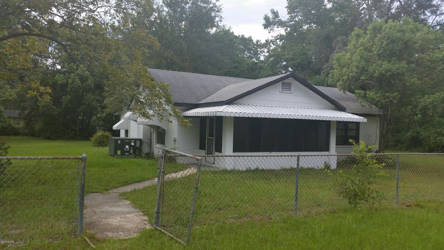 HOT LITTLE ITEM IN HIGHLY POPULAR LYNN HAVEN. BLK. HOME ON SLAB ON 1/2 ACRE FENCEED IN CORNER LOT WITH 100% FINANCING AVAILABLE !!  12X20 DETACHED GARAGE/WORKSHOP. 19 X 08 SCREENED FRONT PORCH AND 12 X 12 COVERED BACK PATIO. ACTUAL YR. BUILT'48, EFFECTIVE YR. '93. SPLIT BEDROOM PLAN REDUCED $10,000. 3 RD ROOM ( REFERRED TO AS A BEDROOM, 17X10, ) DOESN'T HAVE A CLOSET, BUT,AT OR NEAR ASKING PRICE, I'M 99% SURE I CAN PERSUADE SELLER TO BUILD ONE. THERE'S PLENTY OF ROOM AND STILL HAVE A NICE SIZE ROOM.