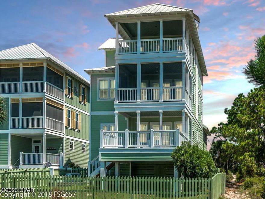 CURRENTLY UNDER CONTRACT, SELLER WILL CONSIDER BACKUP OFFERS.  LUXURY 4BD/4BA BEACH HOUSE WITH UNOBSTRUCTED GULF FRONT VIEWS IN GATED COMMUNITY OF JUBILATION! Located in one of the premier neighborhoods on the South Cape is this fully furnished and move-in-ready home richly detailed with original hardwood floors, custom doors and crown molding. An authentic blend of traditional and modern design is featured on the main level from the granite hearth fireplace and built-in shelving to the coordinating granite kitchen counters, gas cooktop and wall oven. Breakfast bar seating opens to the dining space for sit down dinners and entertaining a crowd. The screened balcony sets the mood for sunset cocktails with a spectacular gulf view. Included on this level is a full bath with walk in shower and ornate vessel sink. Downstairs is an expansive primary suite with double vanity, glass enclosed shower and soaking tub. An equally spacious gulf front deck is ideal for taking in an early morning sunrise & sunbathing. For added convenience, the elevator extends to the top floor, leading to two guest rooms each with private balcony access and a shared bath. Rounding out the layout is a mother-in-law suite complete with a full-size kitchen, bedroom, bath and separate walk-out deck for private entry. Situated on over an acre, this tropical oasis is beautifully landscaped with a fenced yard and direct boardwalk beach access. Conveniently located near the clubhouse & community pool, this home is a must see for investment potential or your personal vacation home. Architectural guidelines & underground utilities are in place to ensure neighborhood appeal & protect natural habitats. Enjoy nearby family friendly Salinas Park for pickleball courts & horseback riding or trek miles of paved walking & bike trails that span the entire Cape. Is it your dream to own a beachfront getaway? Take the 3D Tour & call for a private showing today!