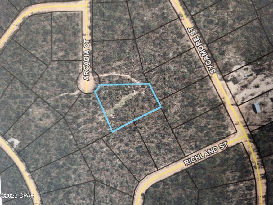 Residential Lot.  Come build your new home away from this crazy PC traffic. In The mean time you can avoid hunting lease fees. This is a 1.4 acre lot in the compass lake area that I have set up to hunt.  It has a food plot cut into the back of the property and a solid shooting house that comes with the sale.   Its covered up with deer.  Just got to be further than I wanted to drive.  Seller is a licensed Real Estate Agent and the selling Agent in this transaction.