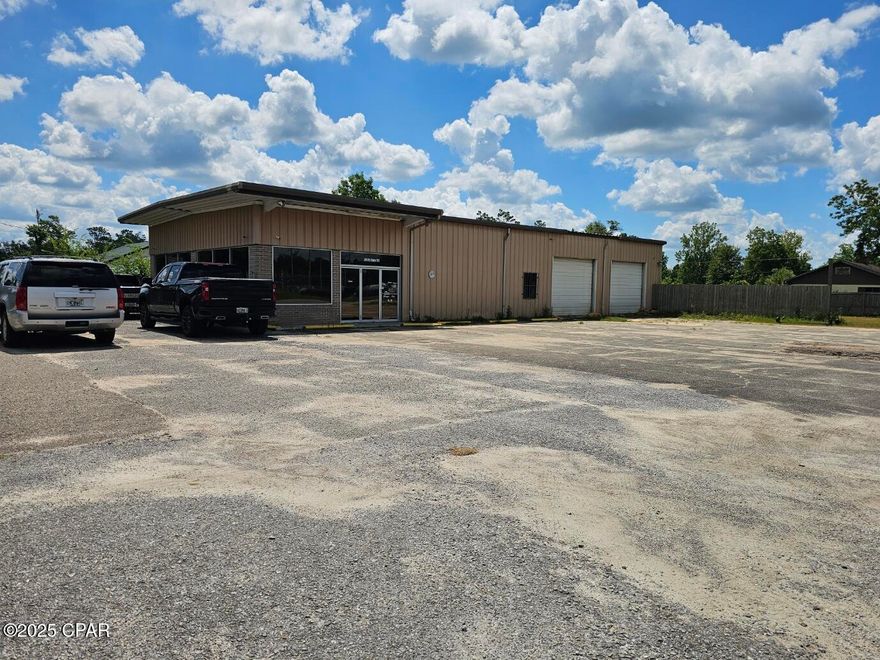 Prime commercial real estate available in Marianna, Florida! Situated on bustling Hwy 90, this 3,836 sq ft building offers exceptional visibility and accessibility. The property features a functional two-bay shop, complete with a car lift and three convenient roll-up doors, ideal for automotive repair or related businesses. Inside, you'll find a spacious showroom perfect for showcasing products, alongside two separate office areas providing dedicated workspace. Don't miss this opportunity to establish or expand your business in a high-traffic location!