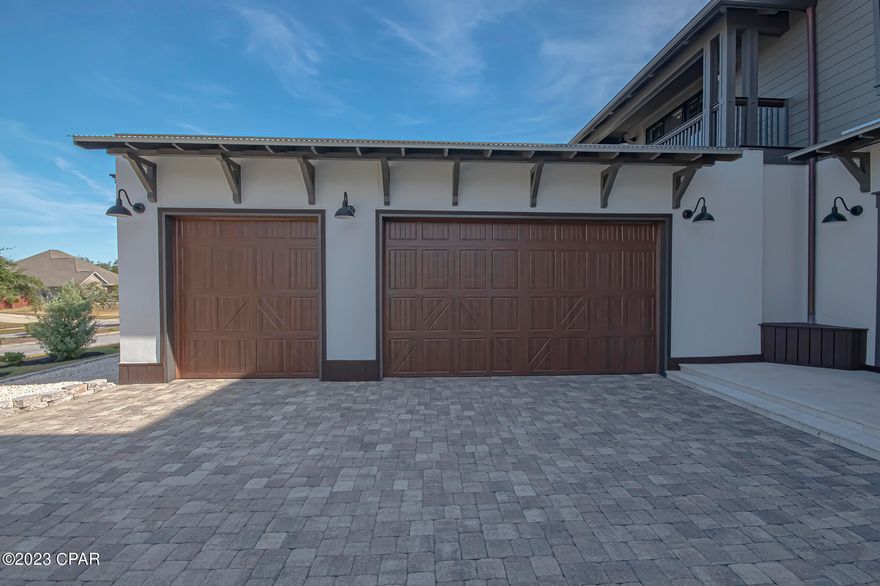 158 Lake Merial Blvd, 30A Luxury without the traffic and high price, absolutely stunning ''Montego Bay'' floorplan, modern and custom build, each of the 5 bedrooms has a private bath, in total there are 6 full baths and one half bath. Begin at the gated entrance and manicured lawns, sidewalks and street lamps and enter the paver driveway with side facing oversize, 3 car garage with epoxied floor, custom metal cabinets, work bench and tool hanger. Enjoy additional privacy with lake access just across the street. Privacy fence with two fenced side yards for garden, play, custom built 300 sq ft outdoor kitchen with teak deck, heated and cooled pool bath w/ tiled shower and 2 person sauna. Quartz counters, under mount sink, Blaze refrigerator, ice maker, Napoleon Built In Outdoor Grill,  Pacific Living Pizza Oven as well as a full size fireplace, all overlooking the 39' x 15' Heated Pool with 8'x8' infinity edge heated spa, 5' wide modern waterfall feature and pool jets, conveniently Bluetooth operated, comfortably entertain up to 100 people. Ample patio space with multiple access doors for home entry. Moving inside, 10'' wide plank distressed European Oak flooring, 20' vaulted ceiling with catwalk in main living room, natural light throughout, first floor media room w/ built in Polk Audio speakers. Smart home - 3 yr. old 24KW solar system (LG Panels) and 20KW with battery backup. Lavel 2 50 Amp EV Charger. CAT 7 wiring to strategic points in the ceiling to mount wireless access points to guarantee excellent cover throughout the home, working from home could never be better. AT&T has 5G Fiber coming in the neighborhood, work from home or have home school in complete luxury! Office and entertainment room has hard wired connections. There is a termination panel under the stairs for all connections and also  connects to the modem in the laundry room. 

The kitchen is out of a magazine -
Chef's kitchen with massive 10'x 6' Carrera marble island, Viking and Fisher Pakel appliances, Butler's pantry with cooktop, sink, All cabinets Blum German auto-soft close hardware and ''Sonic'' Ice Maker, 200+ bottle wine cellar with custom Ipe interior, Substantial dining, easily fitting dinners of 25+ people and just off the dining is a sitting Library / Office with double 5' x 8' shaker pocket doors. Windows abound w/ pool and outdoor entertainment views.
Breath taking, massive 960 sq ft Primary suite w/ 2 private balconies combined for 320 sq ft, Shiplap feature wall, 20'' x 20'' Rainfall shower in Master with Body Jets and 6' Soaker freestanding tub.
Additional interior bonuses to not overlook- Every bath has custom marble,  Culligan Water filtration system ,Deep well for irrigation and pool, 100% of lighting in home LED, LaGrande Adorne Smart home lighting controls, Anderson Series 400 windows, Solid Copper feature gutters ,Series 18 super-efficient HVAC system, 5x Rinnai Gas water heating,  
8' solid doors throughout
12'' shaker baseboards
bull-nosed corners throughout, 8'' walk thickness, built to the latest hurricane proof building codes,
loads of built-ins including mud room with shaker panels and backpack/coat hooks and shoe cubby.
Outdoor bonuses to notice - 8' Teak privacy fence, 4 private balconies, Solid Concrete architectural wall around front of house, modern pavers and hand fit Ipe elevated walkways and landing. 2 Separate side yards perfect for dog runs and separate from outdoor entertainment areas. Bozeman School (K-12) is withing walking distance, gated community, private lake for residents, airport within 30 minutes! (**To Note-115 Lake Merial Place sold at 1.475mm Oct 20, 2023! This one is larger, more beds and baths and higher end construction and finishes!)   Absolutely remarkable build, no boxes unchecked, this one is an opportunity, home ownership at its finest!