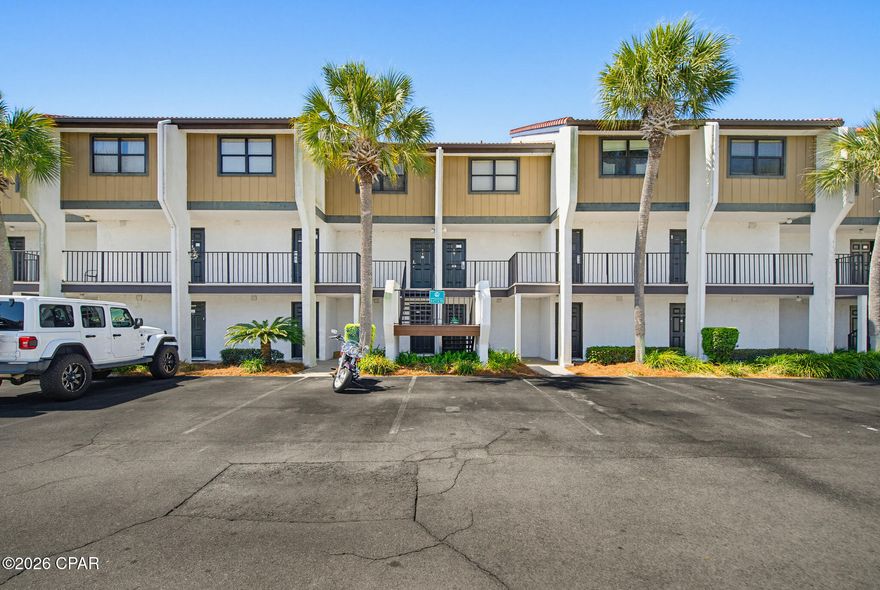Seller did many updates that are listed in the document section. Located in the highly desirable Edgewater Beach & Golf Resort in the heart of Panama City Beach. This beautifully maintained unit offers the perfect combination of convenience, comfort, and coastal charm, all within walking distance to the white sandy beaches of the Gulf. From the moment you step inside, you're welcomed by a bright and inviting space designed for both relaxation and functionality. The open-concept layout seamlessly connects the living, dining, and kitchen areas, creating an ideal setting for entertaining or enjoying quiet evenings at home. Natural light fills the unit, enhancing its warm and airy coastal feel. Enjoy peaceful mornings and unwinding evenings overlooking the lush golf course, paired with glimpses of the Gulf waters in the distance. This rare blend of golf course and ocean views creates a tranquil setting that truly captures the essence of Florida living. The adjoining dining area flows effortlessly into the living space, ensuring you're always connected whether hosting guests or spending time with family. The bedrooms offer comfortable retreats, each providing a relaxing atmosphere and generous space. Whether you're using the property as a primary residence, vacation home, or rental investment, the layout supports a variety of lifestyles. Living in Edgewater means access to an impressive array of resort-style amenities. Residents enjoy the pools, tennis courts, a fitness center, and a premier golf course--all within a gated community that offers both security and a beautifully maintained environment. Location is key, and this property delivers! Owners amenities are easily accessible by the pedestrian bridge or free golf cart shuttle provided by the Association.