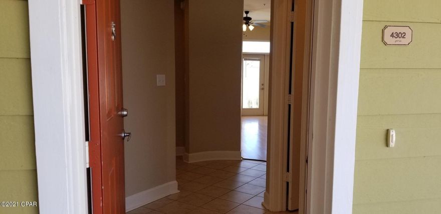 CURRENTLY UNDER CONTRACT, SELLER ACCEPTING BACKUP OFFER. What could be better than a corner unit at Island Reserve?  Try the corner unit that is closest to the garage!  You will love the easy access and convenience as you exit your car and walk straight up to the very first unit which could be your new home. As you enter into your 1325 sq ft. condo you will love the 10 ft. ceilings, crown molding, & open floor plan. This 2 bdrm 2.5 bath home is a split floor plan & each bdrm has its own master bath w/walk in closet. Each bdrm also has a private entry to the patio.  Enjoy the privacy that this unit offers as you relax on your covered patio enjoying the beautiful view of the manicured grounds.  Entertain friends and family in your gourmet kitchen w/island, granite countertops, stainless steel appliances, custom cabinetry & recess lighting. This is
one of the most sought-after communities on Panama City Beach. A Great Place To Retire! Try your hand at pickleball or enjoy a night at the game room playing cards and laughing with your new neighbors or just enjoy the community parties held several times throughout the year. Island Reserve offers amazing amenities such as a 1-acre Lagoon style pool with 3 waterfalls, swim lane, splash pad, hot tub, indoor basketball court, fitness center, updated game room, pool table, theatre room, security, and gated community. This is your opportunity to enjoy all the beauty and relaxation offered by this upscale community! Island Reserve is centrally located for easy access to the many restaurants, shopping, entertainment, fishing, golfing, and of course just a bike ride away from the world's most beautiful beaches! Don't let this one getaway. Call today.