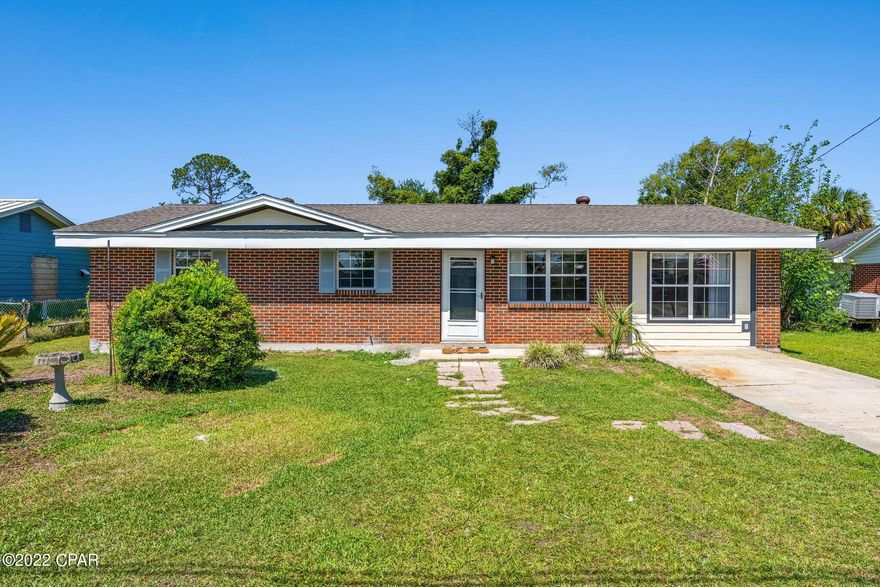 Move in ready home in an ideal location in Panama City, Florida! Few minute drive to St. Andrews Marina. Home is in prime location for shopping, dining, schools, parks, boat ramp and less than 15 minutes to the beach! The big backyard is flat, high & dry perfect for kids & entertaining. This home has been fully remodeled with NEW roof, windows, stainless steel appliances, light fixtures, ceiling fans and new flooring throughout. Fresh paint inside and out. No HOA. Flood Zone X. This home will not last!