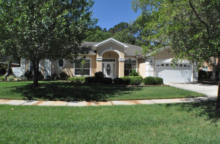 Fabulous home in the Woodrun community of Lynn Haven waiting for a new family!  This 3BR/2.5BA beauty has a freshly painted interior and features an open-floor plan with formal living and dining rooms, a bonus room/office, and a family room with fireplace and a set of French doors that open to the Florida room.  The eat-in kitchen boasts Corian countertops and a five-burner gas stove, and the breakfast nook has a Bay window that overlooks the privacy fenced backyard.  The Master Suite includes an extensive closet system with his-and-hers walk-ins, another set of French doors that opens to the Florida room and an en suite with double sinks, garden tub and a separate shower. thanks to whole-yard irrigation system on separate well.Behind the home is a conservation area so noworries about homes being built behind you.  The home has had some recent upgrades and is move-in ready.  The Woodrun community has sidewalks that wind through the neighborhood and you're less than 5 minutes to shopping, schools, restaurants and so much more!