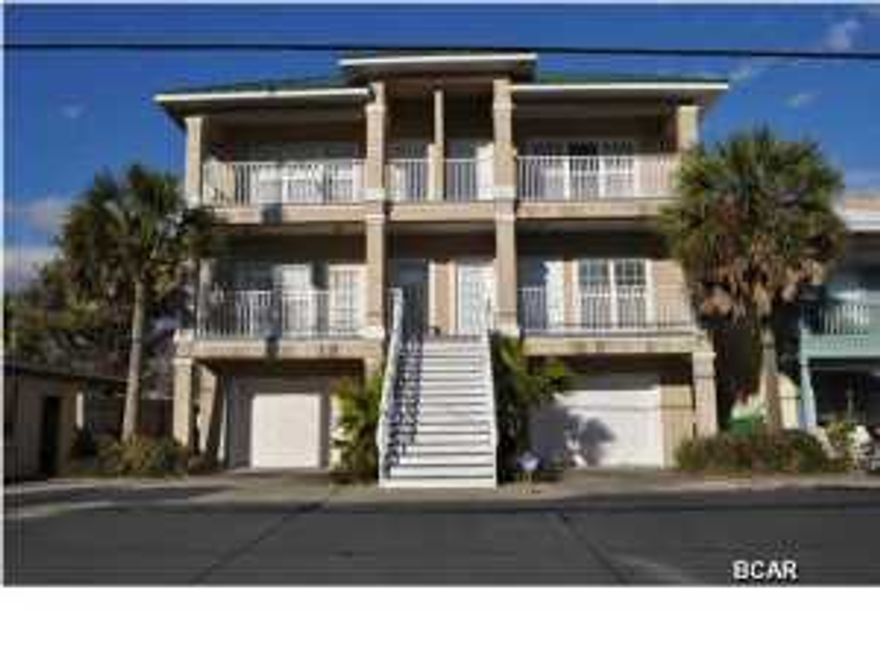 BRAND NEW PEADEN AC INSTALLED. Gulf view and no HOA fees! This would be a wonderful home for a large family who likes style and luxury. Beach access is across the street and you're only about a 5-10 minute drive to the 30A corridor or Pier Park. This 3-story beauty is being sold fully-furnished and you'll love the Palm Beach style decor. And don't let 3-stories scare you; there is a hydraulic elevator that is whisper quiet and quick. The living room and kitchen are located on the second level. The kitchen boasts granite counters and stainless steel appliances. There is also a balcony where you can enjoy the gulf view. The Master Suite on the 3rd floor also has a balcony and an even better view of the gulf. The en suite includes a granite topped double sink vanity, huge-walk-in shower