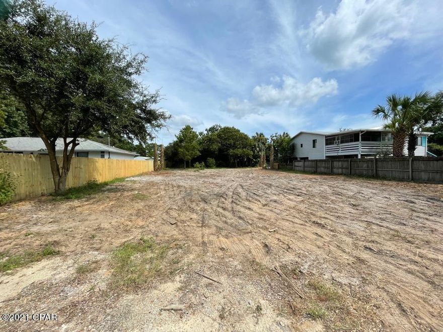PRICE REDUCTION! Motivated seller. Reduced to $124K. Cleared lot only a half mile to the beach! Ready for your Dream Home! Great Buildable lot. Perfect for a duplex. Short term rental allowed. Laguna Beach area on the west end of Panama City Beach! No HOA fees. Oversized Lot, 70 by 175 deep. Septic needs updating. There is plenty of space for an RV or Boat. Only minutes to Pier Park, Frank Brown Park, conservation trails and more. This convenient west end location is only a couple miles to Hwy 79 access to Northwest Florida Beaches International Airport and a short drive to scenic highway 30a. Measurements Approximate, please verify.