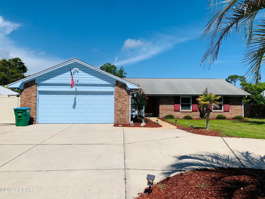 You are in LUCK!  This home is back on the market due to no fault of the Seller.  Come see this charming sturdy brick home with a heated in-ground pool in Panama City Beach, Florida.  This three bedroom two bath home is located on a beautiful street right off North Lagoon Dr. and just down the road from The World's Most Beautiful Beaches!  This home has a fully screened-in, heated concrete pool that was just resurfaced in 2019.  The screen and pool cover was replaced in 2019 and the pool heater was replaced in 2022.  You will love the vaulted living room ceiling, bamboo hardwood floors and open dining area.  The kitchen provides a breakfast area and breakfast bar.  Relax in the spacious Sun Room leading out to the pool area.  The home has new windows throughout and you will have comfort knowing your windows are protected with custom metal storm shutters.  Bedroom 3 and the garage both feature custom built-in cabinets. The exterior features new vinyl privacy fence, open patio area for cookouts, storage building with power, sprinkler system and well.  Well installed in 2013 and water softener system was installed in 2015.  Don't delay and call your favorite Realtor today!