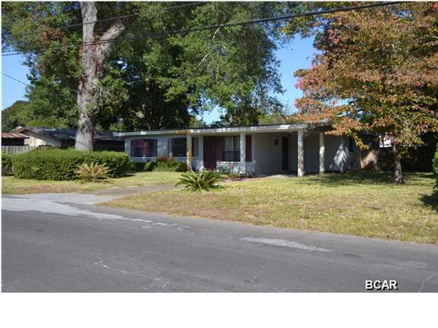 4 bedroom, 2 bath home with over 2000 square feet of heated and cooled living space. This home was built with solid concrete block construction for strength and durability. Use your imagination to turn this into your dream home. The lot is shaded with plenty of trees and has a fenced in back yard with a storage shed and separate well for watering the lawn. The neighborhood shows great pride of ownership with many very nice waterfront homes in the area. Come see this one today!!!