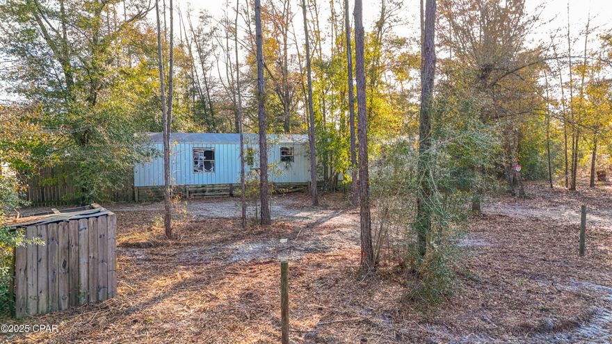 Beautiful lots in Fountain area just off of Highway 231 totaling almost a full acre.  Property has a dilapidated mobile home that is given no value.  All information and measurements are taken from the Public Records.  If important to buyer, please verify.