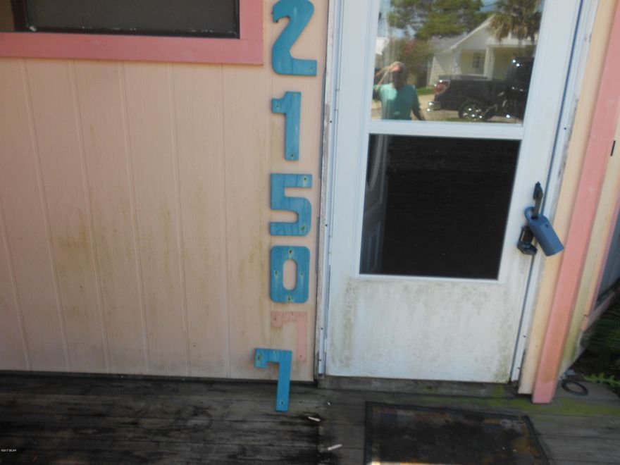 This is your typical little Beach cottage that needs a new owner. Located on the west end of Panama City Beach and only three blocks to the Beach. At this price there is obviously work that needs to be done on this home and that is why we have it priced the way we do. Large backyard for the Beach and a lot of the neighbors have already refurbished some of these homes.