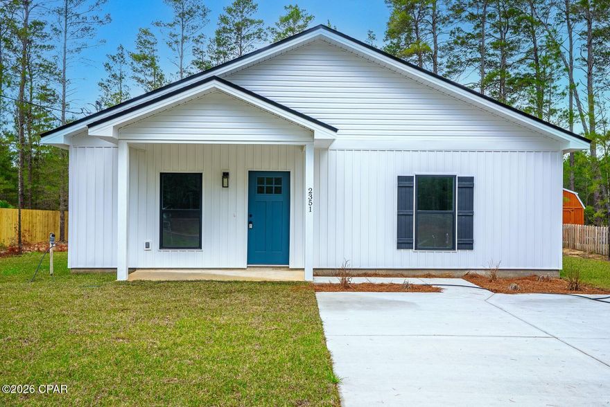 Located in desirable Sunny Hills Unit 1, this brand new LUXURY Dawn floor plan 2-bed, 2-bath home features 9 ft. ceilings, quartz countertops, tiled shower, and kitchen backsplash. Kitchen is styled with a trendy stainless, farmhouse apron-front sink, complete with commercial-style pull-down faucet. Premium vinyl plank flooring throughout (no carpet!), GE appliances, and soft-close shaker cabinets with black matte cabinet pulls, not to mention energy-efficient windows. Complimentary exterior colors offer maximum curb appeal. An AMAZING feature of this home is that to the front across the road and to the back, this home is surrounded by huge tracts of non-platted parcels (7.44 in front and 52.15 in back), providing SO much privacy! You'll feel so much in the country that you'll hardly believe how close you are to Hwy 77! In this location, besides our own beautiful and popular Boat Lake Swimming & Recreation Park, County Library, Wilder Skate Park, plus so many fishing lakes and ponds, you will have easy access via newly 4-laned Hwy 77 to PC, PCB, with our gorgeous emerald green waters and white-sand beaches, Chipley and I-10 to the north by 20 minutes, and all the very best the Florida Panhandle has to offer. ***PS With an acceptable offer, seller will contribute $5000 towards Buyer's pre-paids and closing costs!*** Please call your favorite Realtor right now to tour this gorgeous, well-built, high quality home with amazing finishes. It's not going to last!
