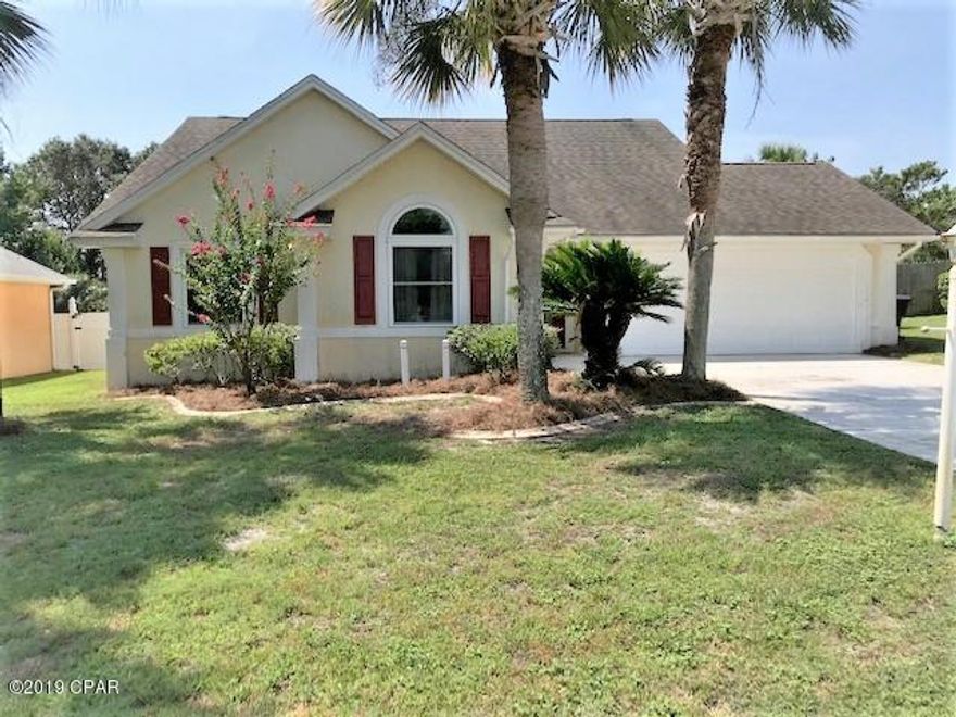 This is a great beach community Home Southfields has underground utilities and is just minutes from beach  access. This home features 10 ft ceilings, chair rail, and crown molding in living area. The windows are hurricane impact rated with a transferrable warranty adding $45K in value. The kitchen is finished with granite counter tops and has a 5 burner gas Viking range. The Family room has a gas fireplace & built-in shelving A large master suite and master bath with 2 walk in closet, skylight & walk in Shower Complete the restful retreat.The Heated and cooled Florida room joins a large screened lanai with Hot tube. Outside is an insulated storage building and Several fruit trees. Call today for your personal tour.